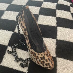 Cheetah high heel purse.